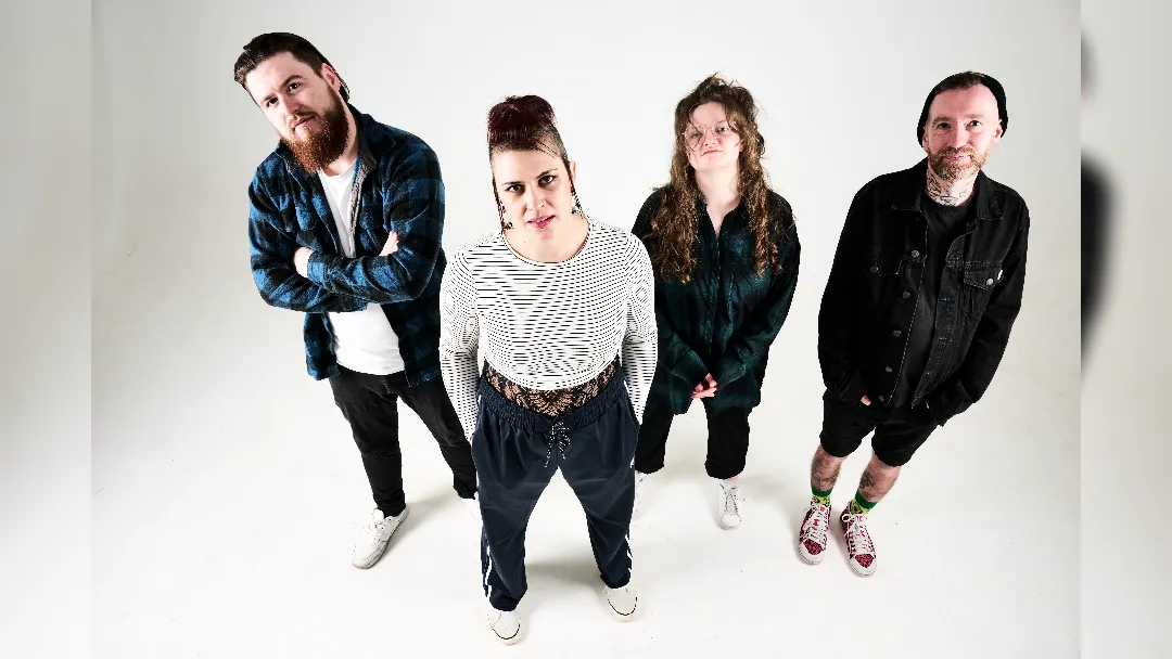 promotional image of Millie Manders and The Shut Up ahead of their UK tour