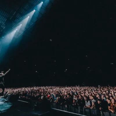 promotional image of Tom Meighan performing live