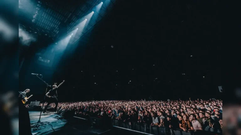 promotional image of Tom Meighan performing live