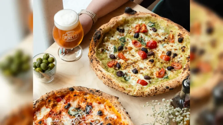 promotional image of a pizza and beer for Rudys Pizzeria Altrincham