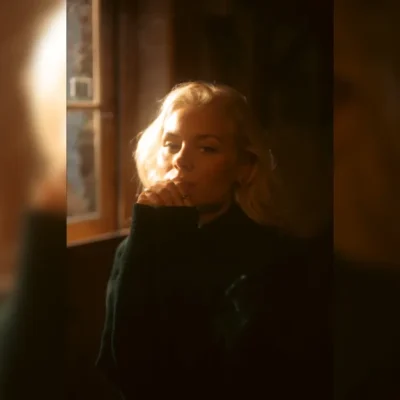 promotional image of Nina Nesbitt ahead of the release of new album Mountain Music. image courtesy Wolf James.