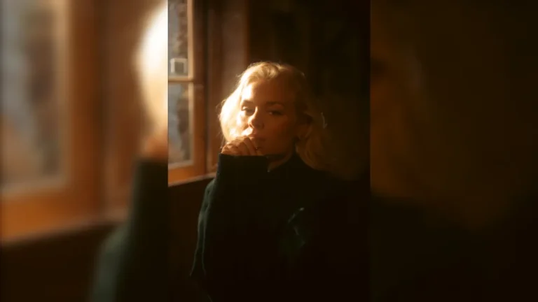 promotional image of Nina Nesbitt ahead of the release of new album Mountain Music. image courtesy Wolf James.