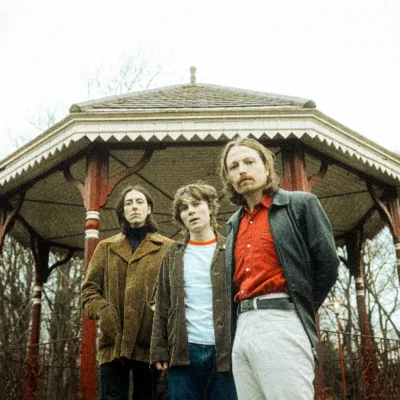 promotional image of The Pale White stood at a bandstand in a park. image courtesy Saint Sophie