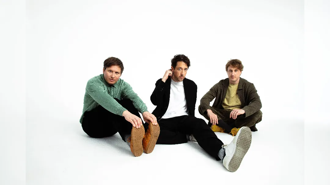 promotional image of The Wombats for new album Oh! The Ocean. image courtesy Julia Godfrey