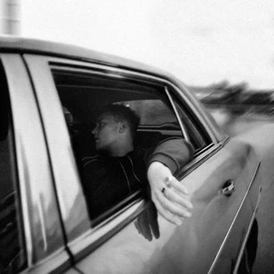 image of Sam Fender sat in a moving car