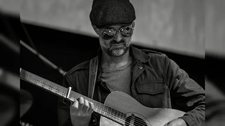 image of Jon Allen playing guitar