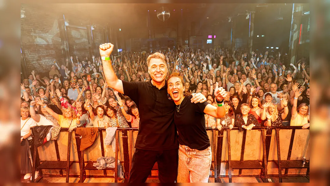 image of the Day Fever organisers on stage