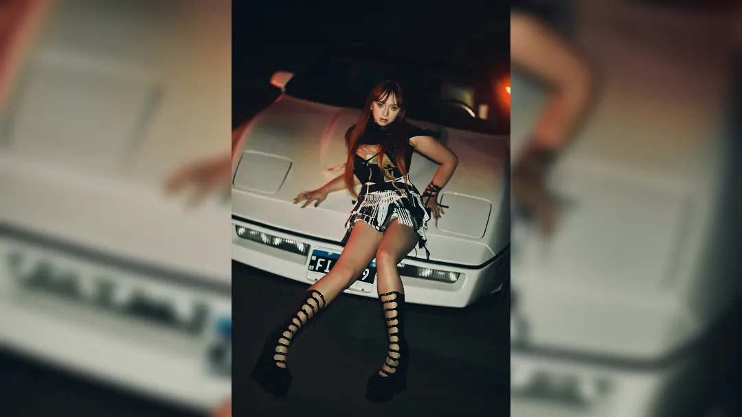 image of EMMMA sat on a white sports car - Photographer Joao Viegas, creative director and styylist Holly Wood Glam - Suyane Abreu